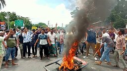 ভাঙ্গায় উপজেলা পরিষদ ও থানায় ভাঙচুর-আগুন, সাংবাদিককে কুপিয়ে জখম